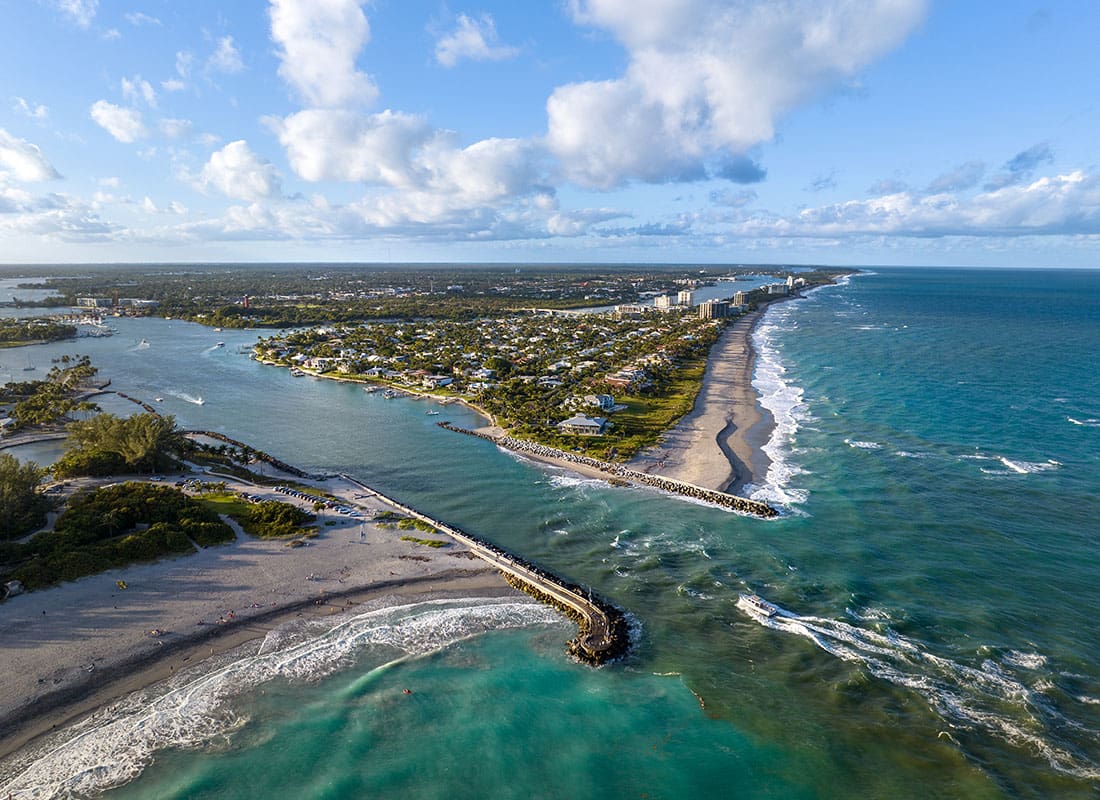 Contact - Aerial View of a Strip of Land on the Coast in South East Florida on a Sunny Day